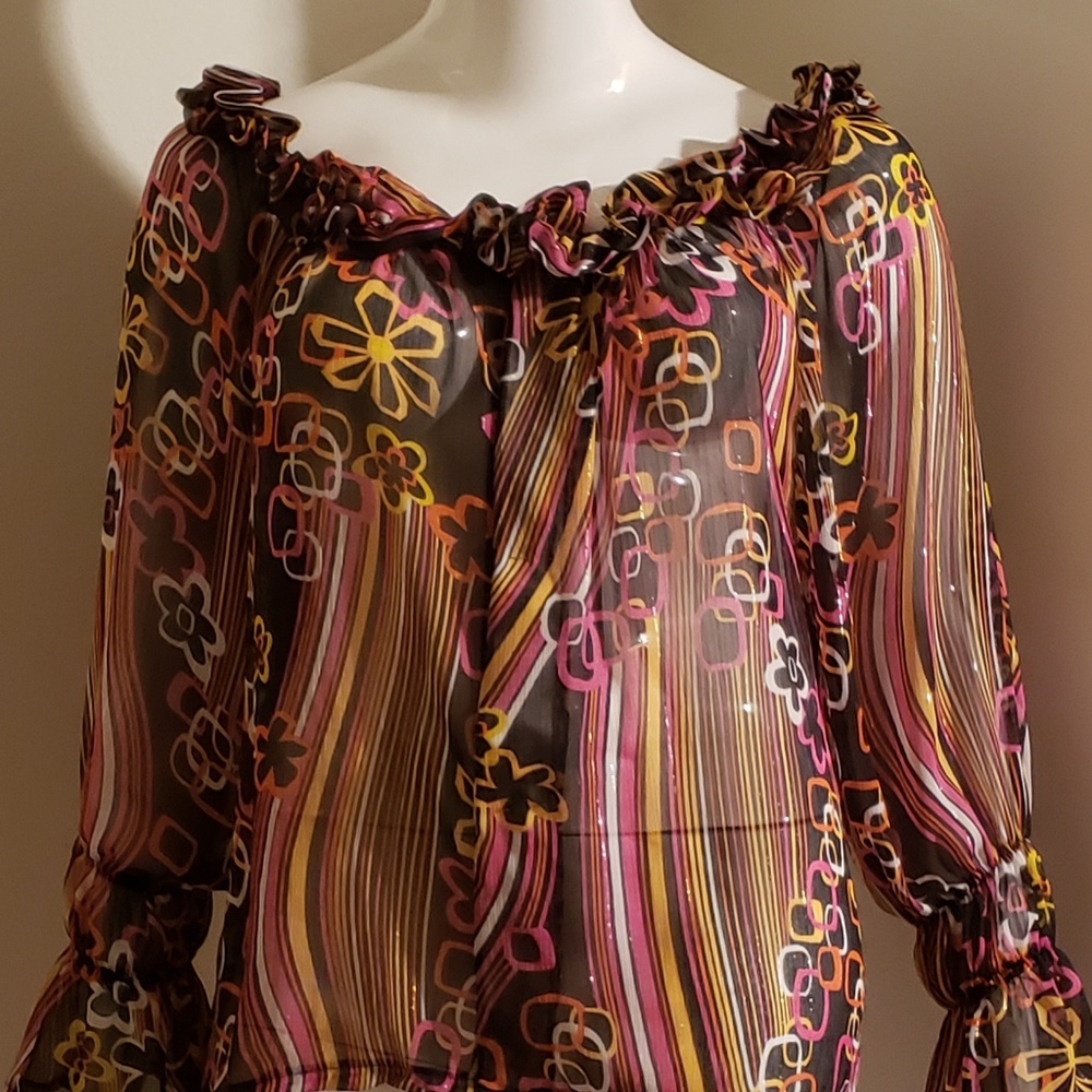 Button front top with ruffle detail